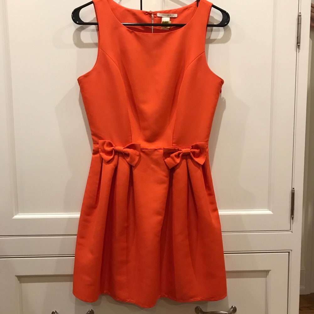 Orange party dress with two front bows!